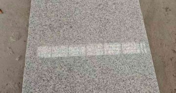 柳州芝麻白光面毛板